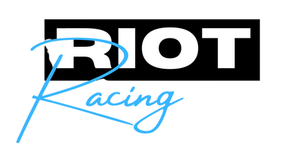 Riot Racing logo with 'RIOT' in white on a black rectangle and 'Racing' in blue below.